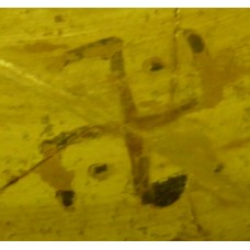 Pre-Christian swastika cross with dots on the sides